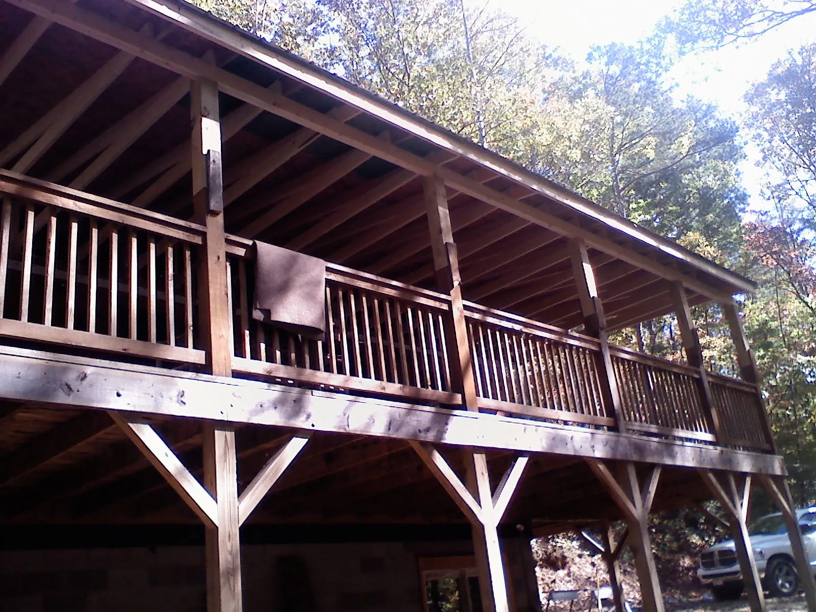 Timber framing under a new elevated porch and deck — Roof Leak Repair in Ashburnham by Roofing Brothers